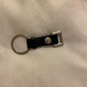 Prada keychain. Black leather.